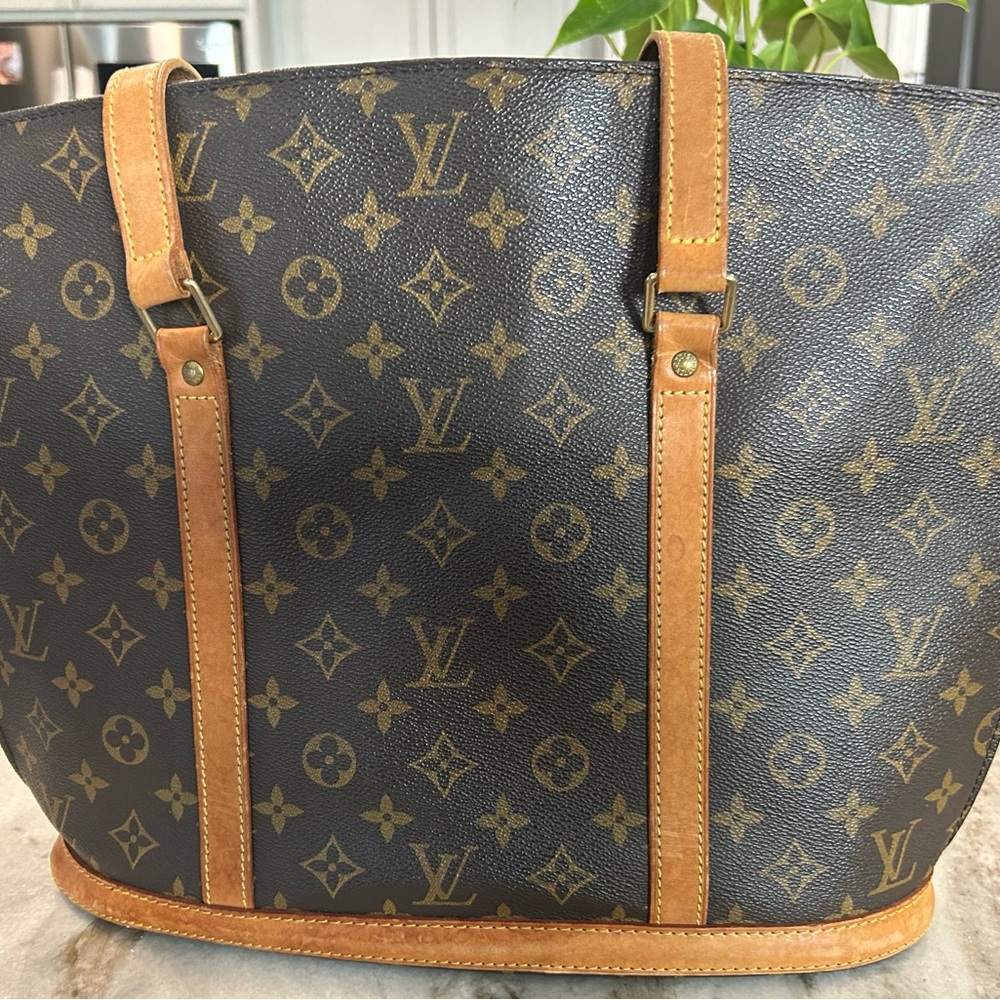 #0030-1157 LOUIS VUITTON MONOGRAM BABYLONE VI0941. Authenticated by Posh